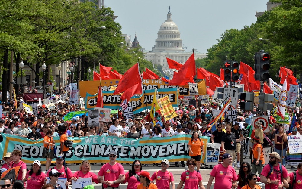 Demonstrators join the People's Climate March in Washington to protest President Donald Trump's stance on the environment April 29, 2017. (CNS/Reuters/Mike Theiler)