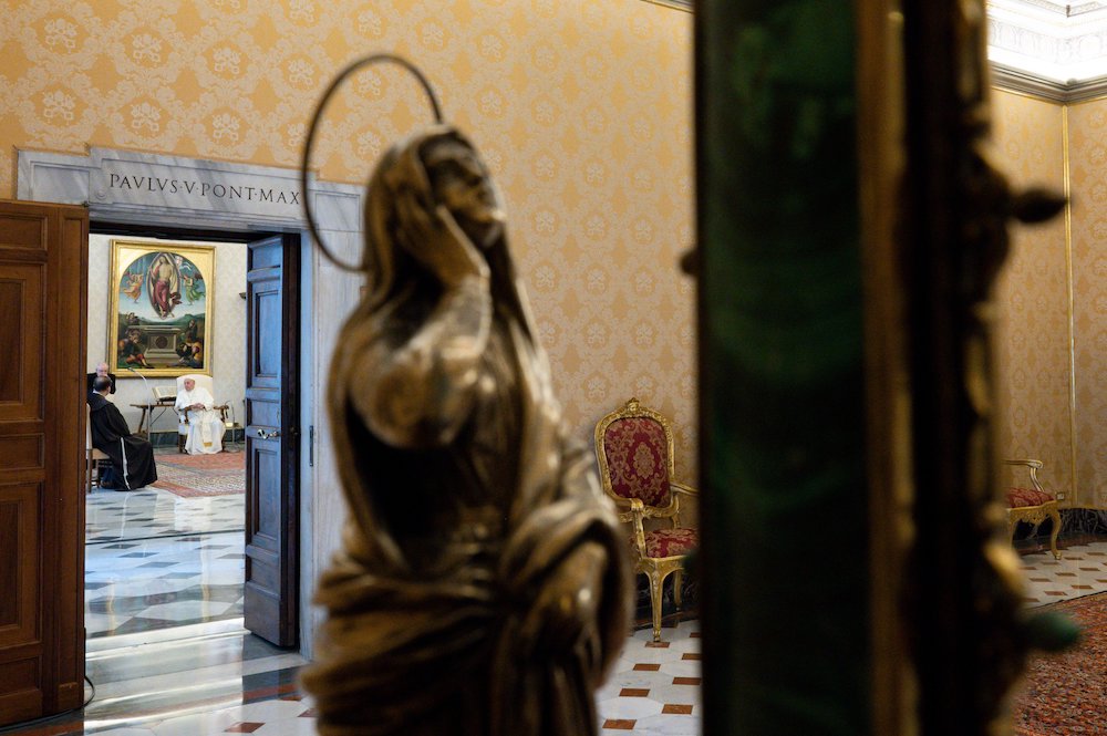 Pope Francis leads his general audience in the library of the Apostolic Palace at the Vatican Nov. 4. The weekly papal audience returned to being closed to the public as COVID-19 cases increase in Italy. (CNS/Vatican Media)