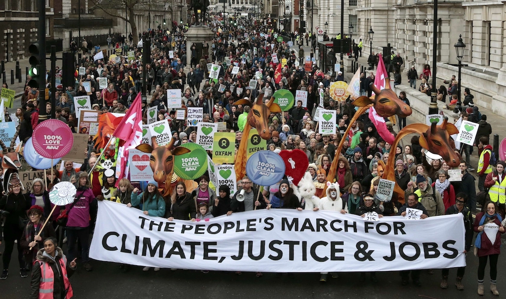 Protesters demonstrate during a rally in London Nov. 29, 2015, ahead of the U.N. climate change conference, known as the COP21 summit, in Paris. (CNS/Reuters/Suzanne Plunkett) 