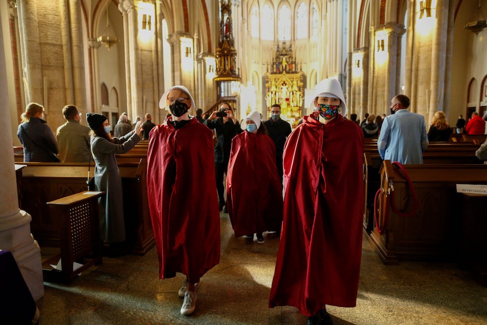 Demonstrators protest Oct. 25 in the Archcathedral Basilica of St. Stanislaus Kostka in Lodz, Poland, against the ruling by Poland's Constitutional Tribunal that imposes a near-total abortion ban. (CNS/Agencja Gazeta via Reuters/Marcin Stepien)