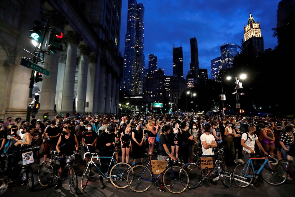 Black Lives Matter demonstrators in New York City block traffic June 30 near an area being called the "City Hall Autonomous Zone." (CNS/Reuters/Andrew Kelly)