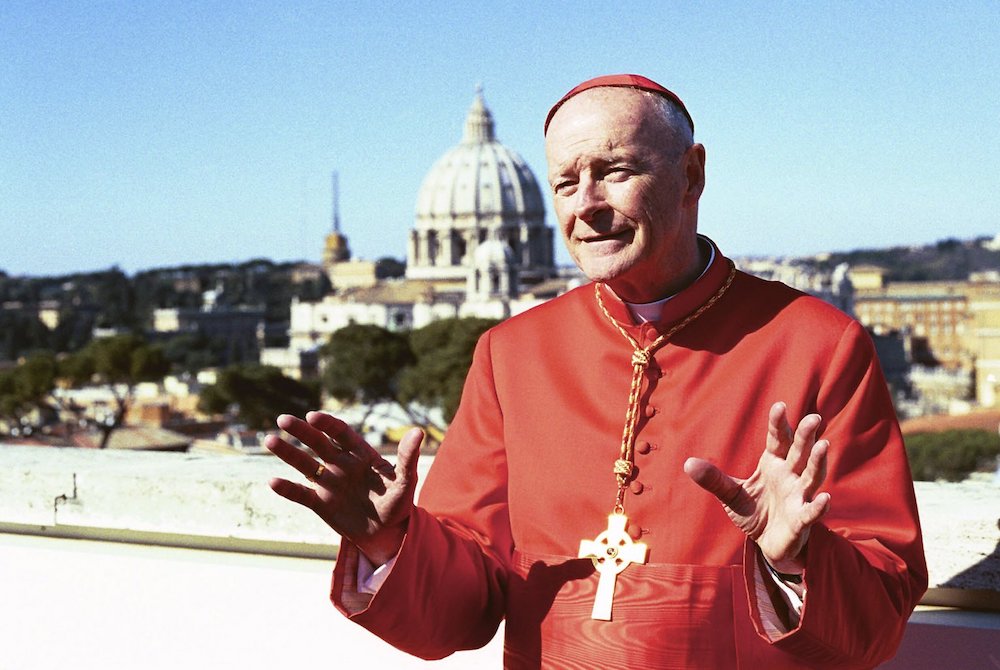 As a newly created cardinal, Theodore McCarrick addresses the media on the roof of the North American College in Rome following a consistory ceremony at the Vatican Feb. 21, 2001. (CNS/Carol Zimmermann)