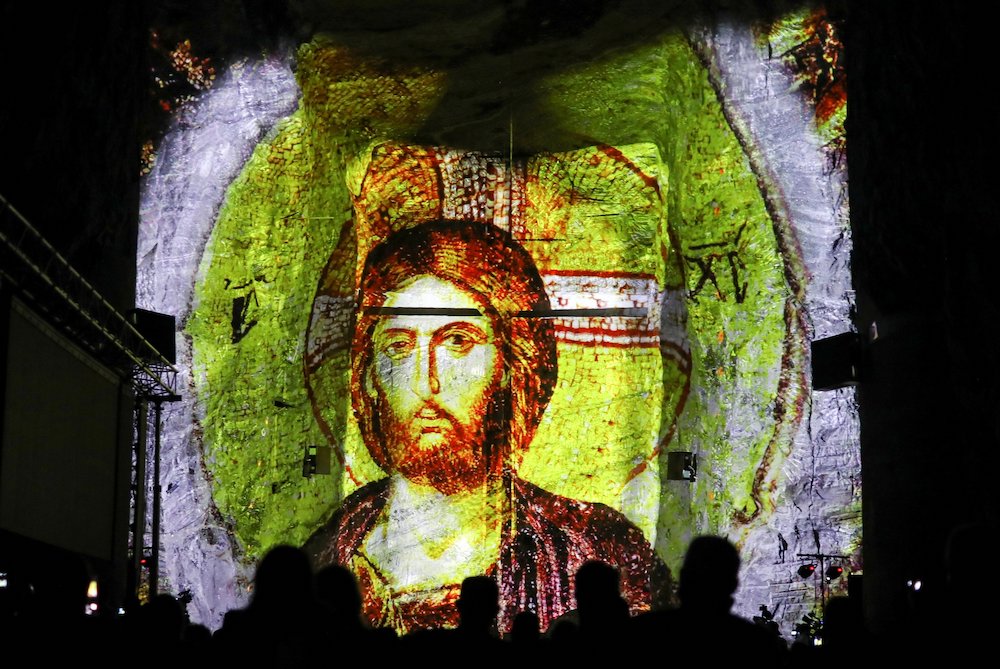An image of Christ is projected during a ceremony to celebrate 25 years of the Salt Cathedral of Zipaquira in Colombia Dec. 16. (CNS/Reuters/Luisa Gonzalez) An image of Christ is projected during a ceremony to celebrate 25 years of the Salt Cathedral of Zipaquira in Colombia Dec. 16. (CNS/Reuters/Luisa Gonzalez)