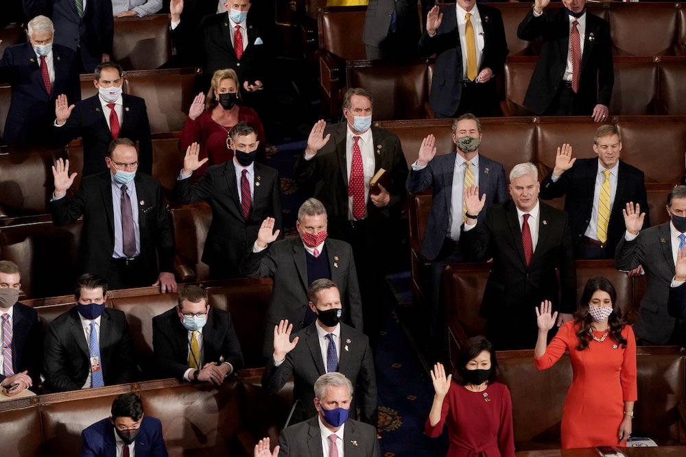 Republican members of the U.S. House of Representatives take their oath of office on the floor of the House Chamber during the first session of the 117th Congress on Capitol Hill in Washington Jan. 3, 2021. (CNS/Reuters/Joshua Roberts)