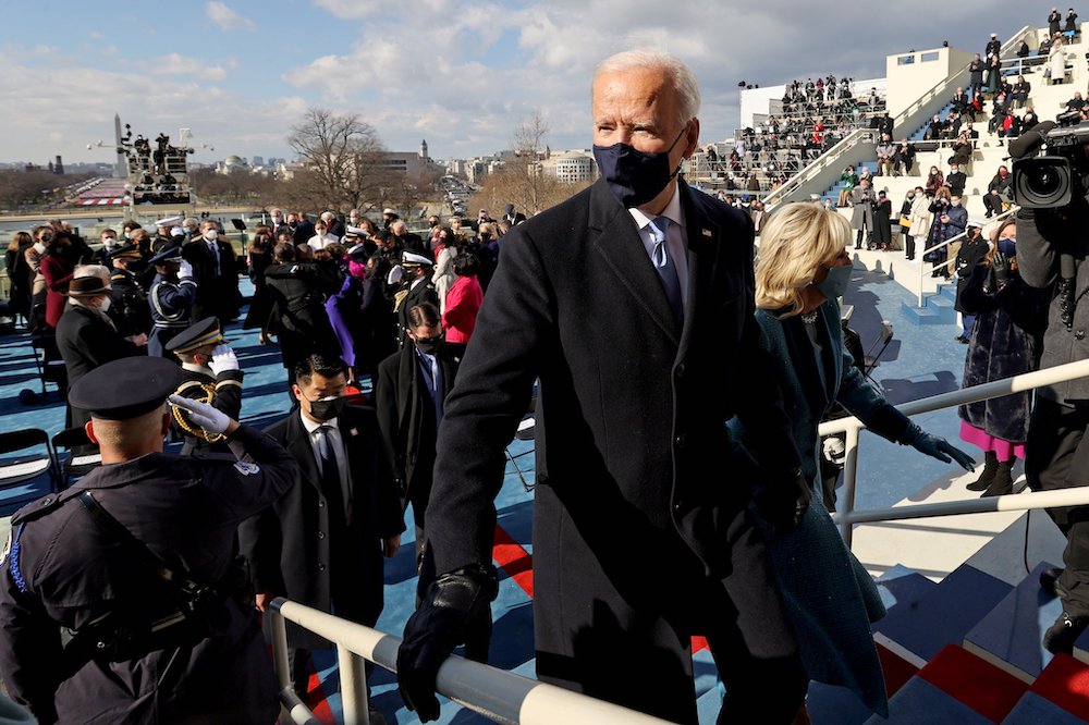 President Joe Biden leaves with first lady Jill Biden after his inauguration at the U.S. Capitol Jan. 20, 2021. (CNS/Reuters pool/Jonathan Ernst)