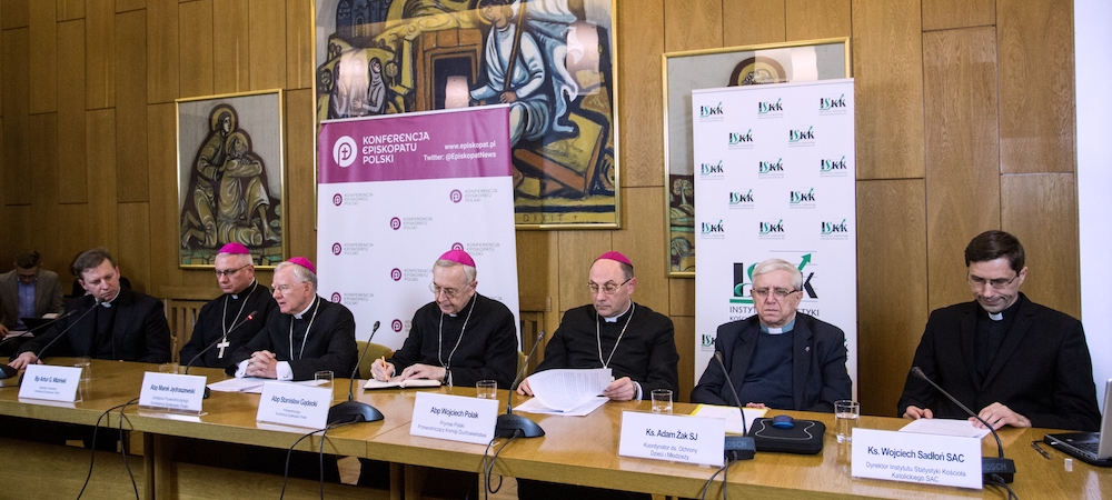 Polish bishops attend a news conference to release the church's first clerical sex abuse report March 14, 2019. In zucchettos, from left, are Bishop Artur Mizinski, secretary-general of the Polish bishops' conference; Archbishops Marek Jedraszewski of Kra