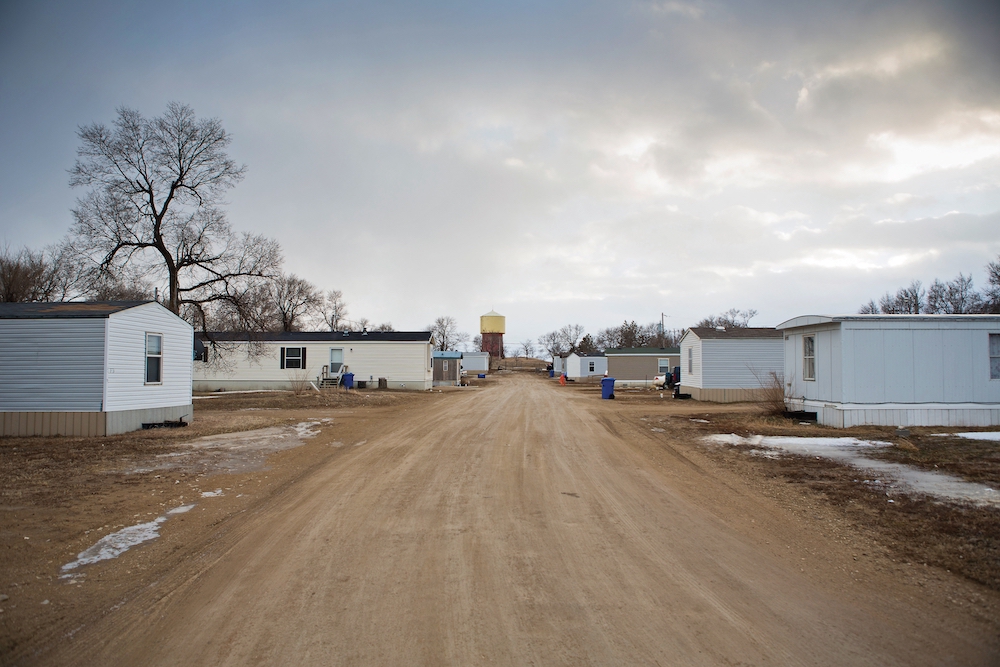 Homes line a dirt road in 2014 on the Rosebud Reservation of the Lakota in south central South Dakota. (CNS/Catholic Extension/Ron Wu) Homes line a dirt road in 2014 on the Rosebud Reservation of the Lakota in south central South Dakota. (CNS/Catholic Extension/Ron Wu)