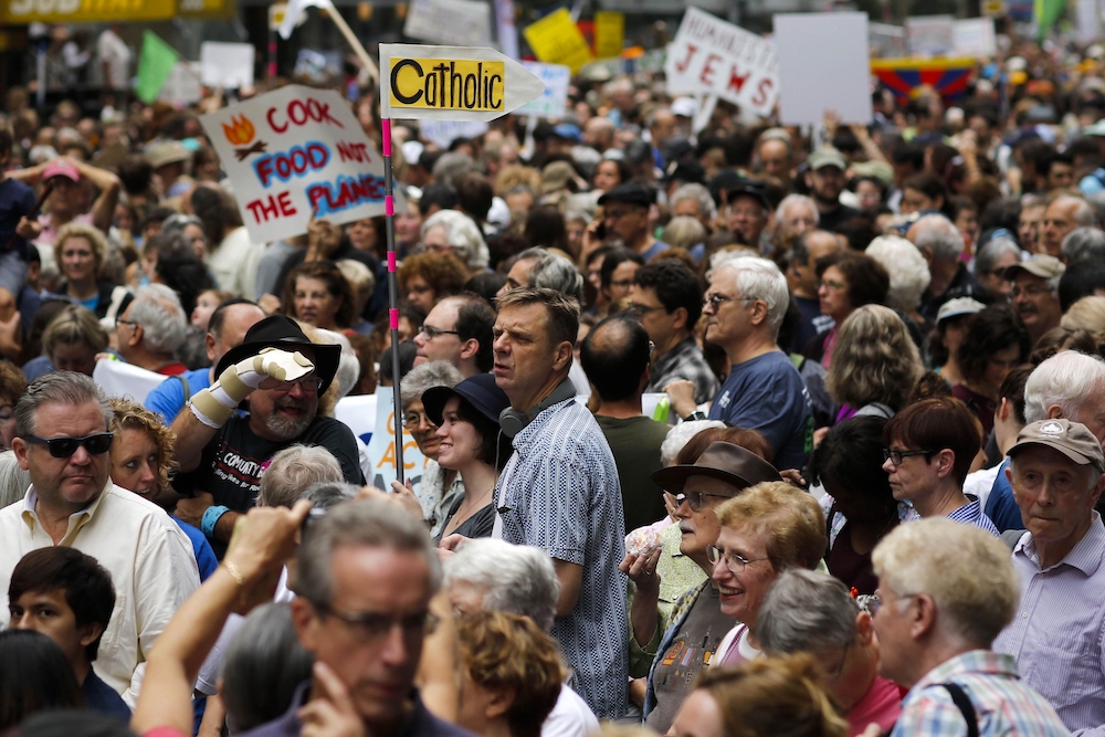 Catholics are among others attending a rally to urge global action on climate change in New York Sept. 21, 2014.  (CNS/Reuters/Eduardo Munoz)
