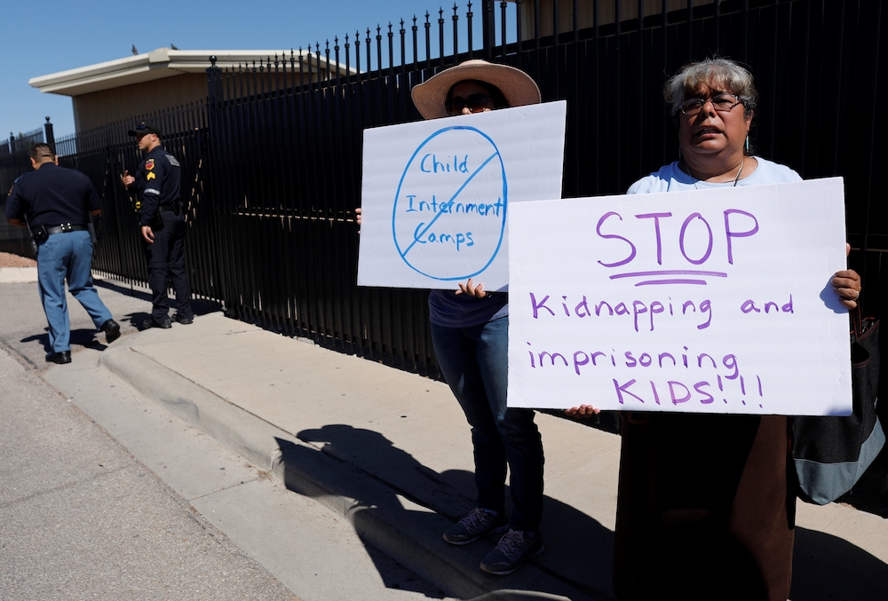 People in El Paso, Texas, protest the Trump administration June 19, 2018, for separating immigrant families suspected of illegally entering the U.S. (CNS/Reuters/Mike Blake)