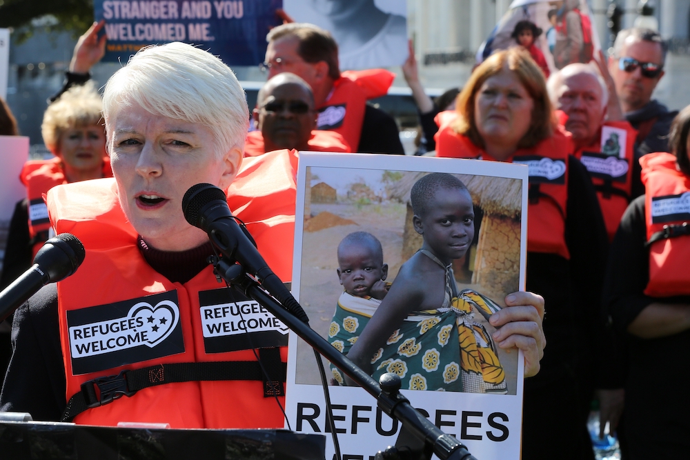 Susan Gunn, director of the Maryknoll Office for Global Concerns, speaks during a protest Oct. 15, 2019, outside the U.S. Capitol in Washington against the Trump administration's cuts in the number of refugees to be admitted. (CNS/Bob Roller)