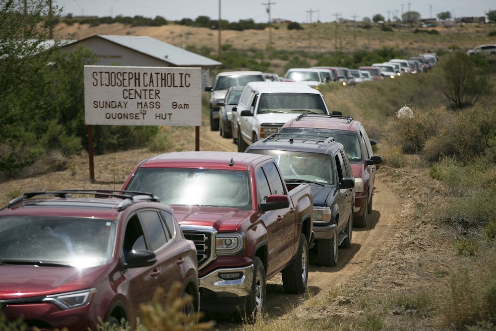Cars in Coyote Canyon, New Mexico, on the Navajos' reservation, are seen lined up May 15, 2020, during the coronavirus pandemic.