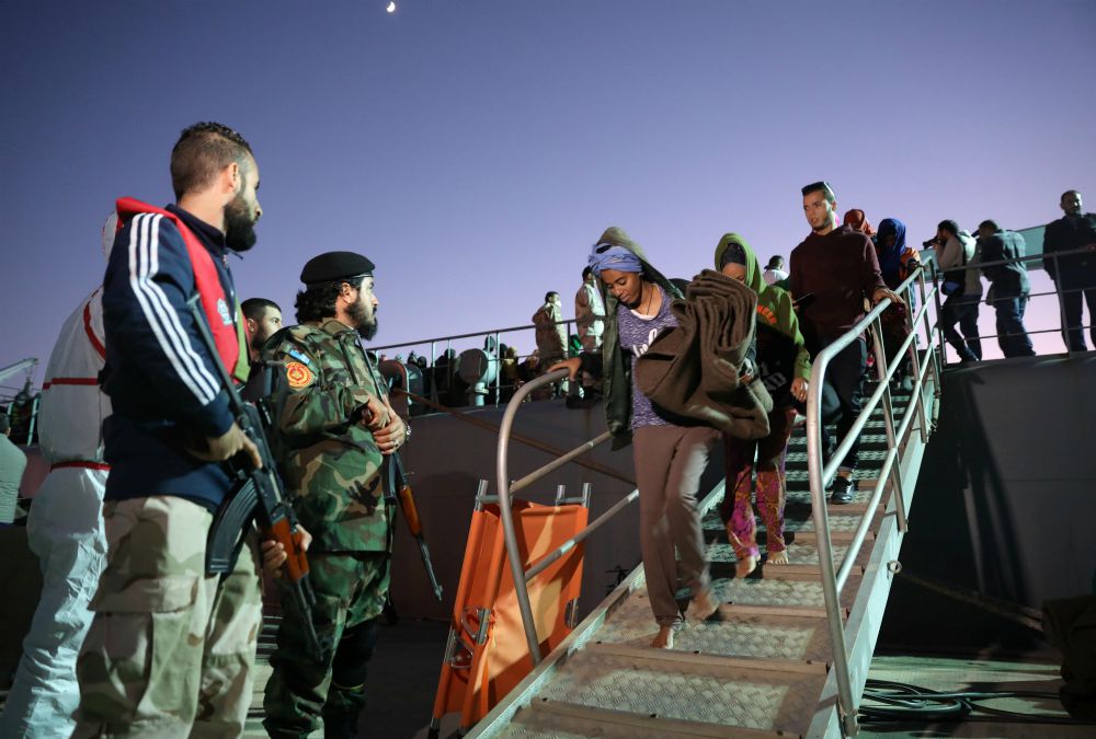 migrants arrive Libya migrants arrive Libya