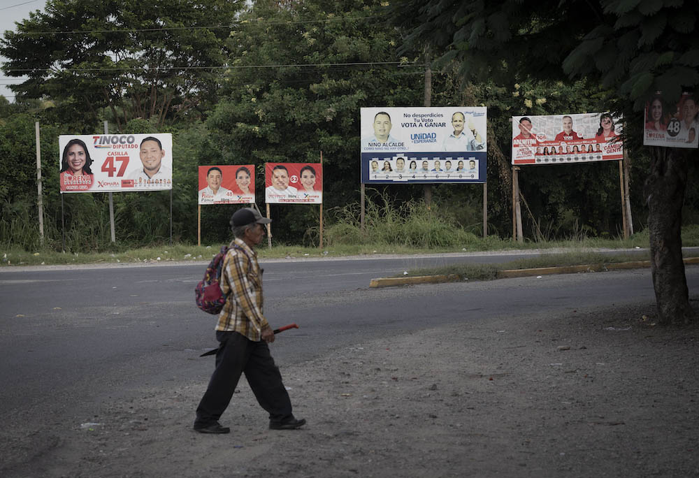 Campaign signs pepper the landscape in Honduras, where voters will cast their ballots in an election some say could mark a new beginning for the troubled Central American nation. (Manuel Ortiz Escámez)