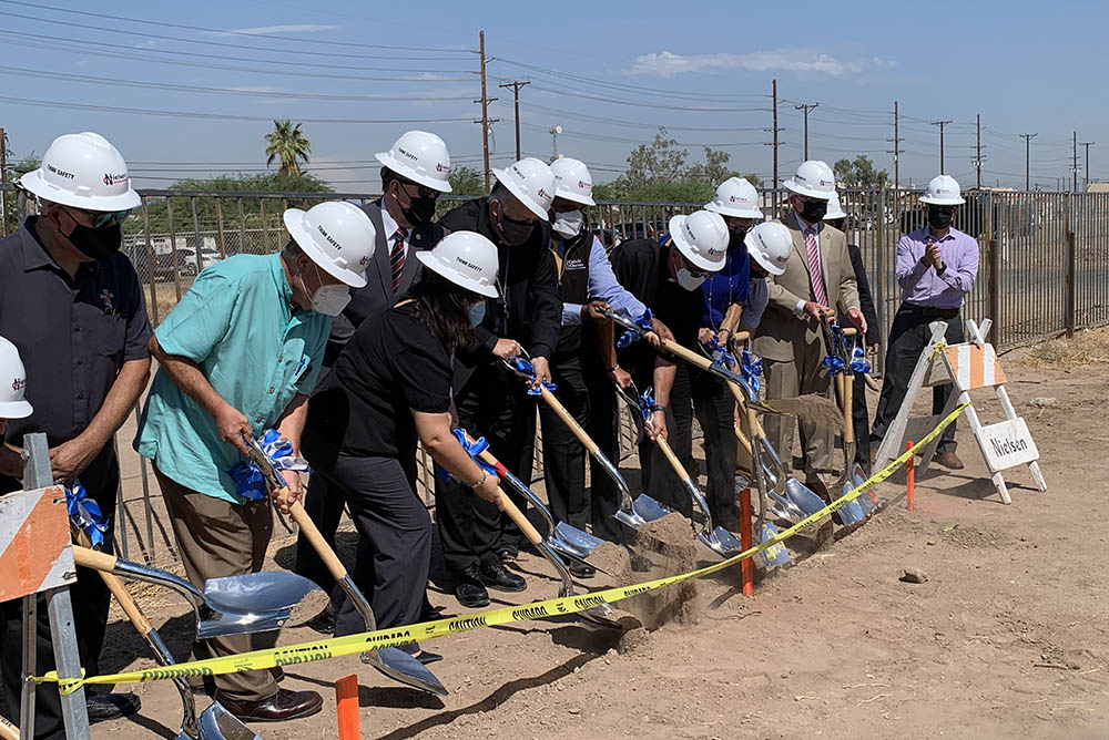 Catholic faith leaders and other local leaders break ground on the El Centro Homeless Day Center in Imperial County in Southern California on Aug. 30. (NCR photo/Melissa Cedillo)