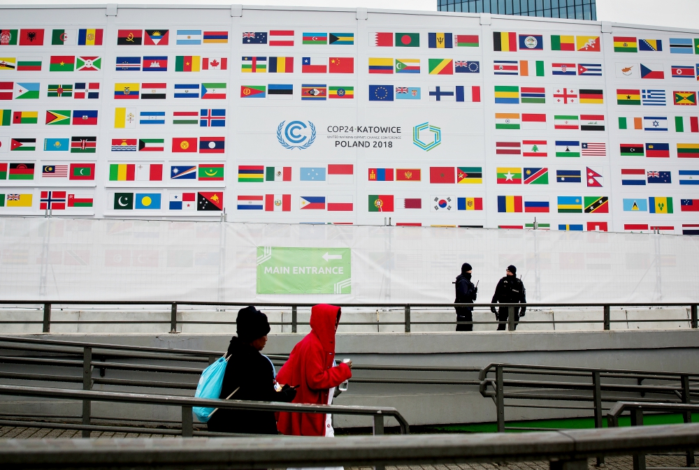 People walk past the International Congress Center during COP24, the U.N. climate change conference in Katowice, Poland, Dec. 3. (Sipa USA/NurPhoto/Mateusz Wlodarczyk) People walk past the International Congress Center during COP24, the U.N. climate change conference in Katowice, Poland, Dec. 3. (Sipa USA/NurPhoto/Mateusz Wlodarczyk)