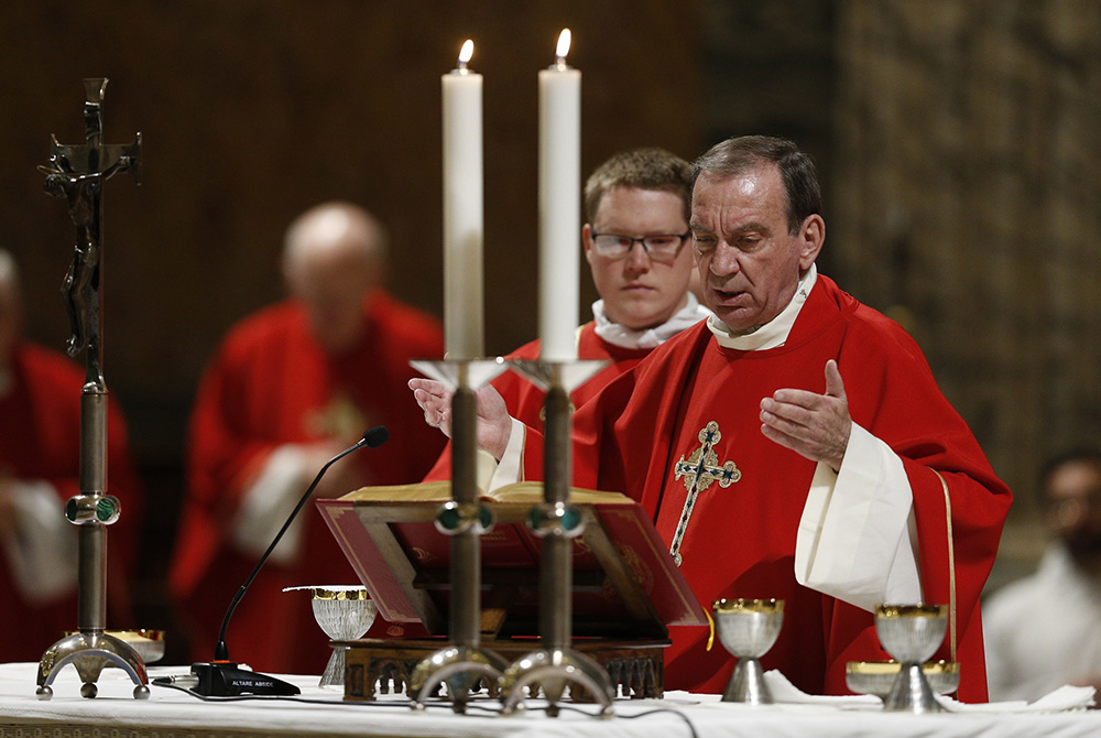Archbishop Dennis Schnurr of Cincinnati concelebrates Mass with other U.S. bishops from Ohio and Michigan at the Basilica of St. Paul Outside the Walls in Rome Dec. 11, 2019. The bishops were making their "ad limina" visits to the Vatican. (CNS)