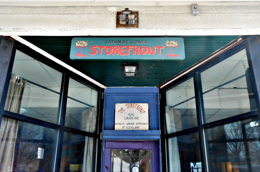 The entrance to the Cleveland Catholic Worker Storefront drop-in center, which offers food, coffee, art and movie nights, and an alternative health clinic (Courtesy of Cleveland Catholic Worker/Paula Miller) The entrance to the Cleveland Catholic Worker Storefront drop-in center, which offers food, coffee, art and movie nights, and an alternative health clinic (Courtesy of Cleveland Catholic Worker/Paula Miller)
