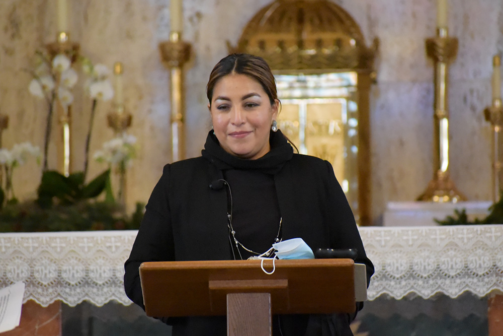 Before the student body of Divine Child High School in Dearborn, Michigan, Daris Bartolon shares about her flight out of Guatemala to seek asylum in the United States. Daris and other leaders of Strangers No Longer have shared their immigration stories.