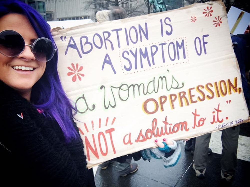 Destiny Herndon-De La Rosa, founder of New Wave Feminists, holds a pro-life sign at the 2017 Women’s March in Washington, D.C. (Courtesy of Destiny Herndon-De La Rosa)