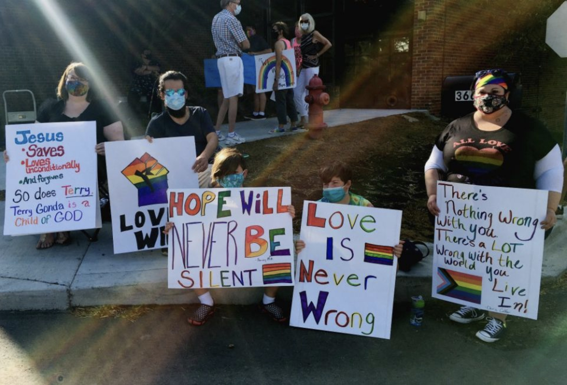 Protesters rally for Terry Gonda, a married lesbian who was fired from her role as music director at St. John Fisher Chapel University Parish in Auburn Hills, Michigan. (Between the Lines/Ellen Shanna Knoppow) Protesters rally for Terry Gonda, a married lesbian who was fired from her role as music director at St. John Fisher Chapel University Parish in Auburn Hills, Michigan. (Between the Lines/Ellen Shanna Knoppow)