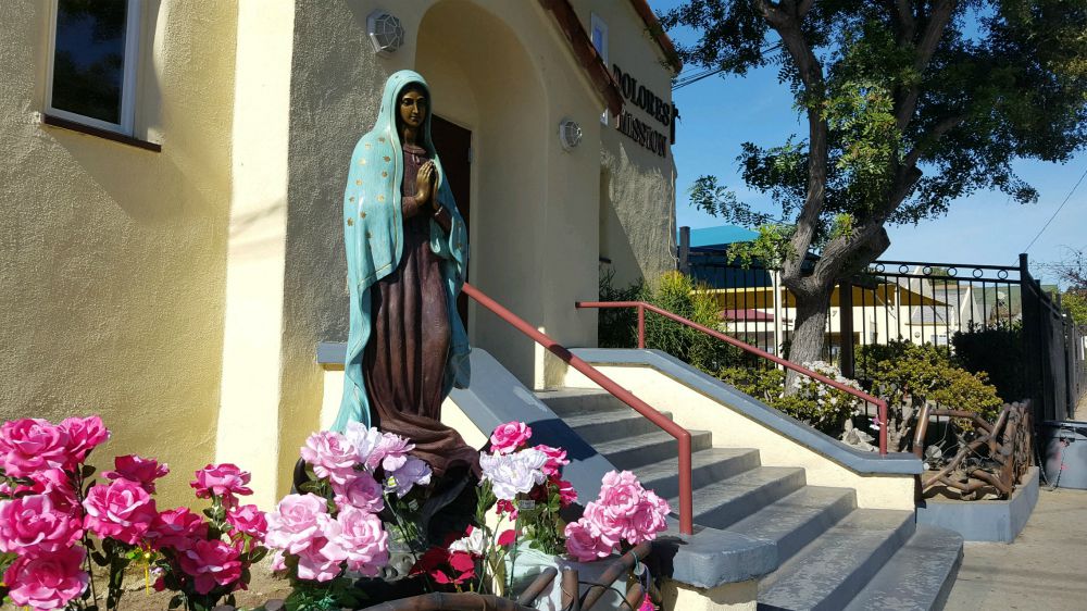statue of Our Lady of Guadalupe outside of Dolores Mission Church