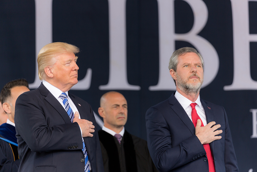 Then-President Donald Trump attends the Liberty University commencement ceremony, with Jerry Falwell Jr., May 13, 2017, in Lynchburg, Virginia. Trump gave a commencement speech to the graduating class. (Wikimedia Commons/White House photo/Shealah Craighea