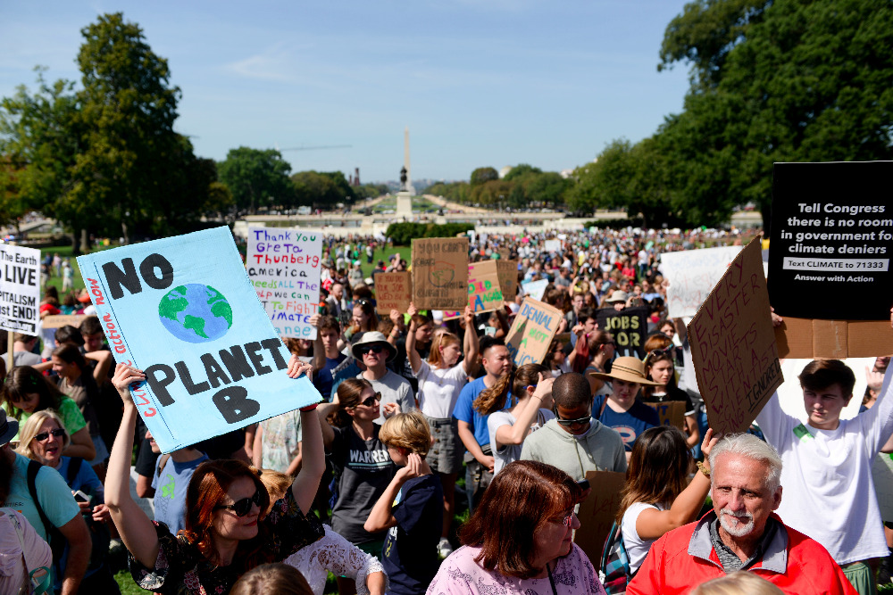 Climate change activists rally in Washington in September 2019. (CNS photo/Carol Zimmermann)