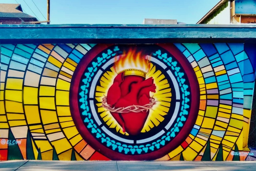 Mural of the sacred heart, called "Sagrado Corazón" by Jesus "CIMI" Alvarado at Sacred Heart Catholic Church, in El Segundo Barrio, El Paso, Texas