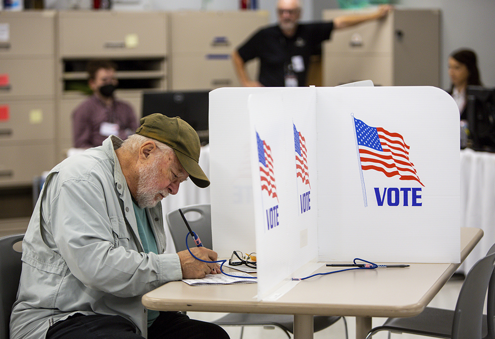 Voters cast their ballots Sept. 23 in Minneapolis. With Election Day still more than six weeks off, the first votes of the midterm election were already being cast that Friday in a smattering of states, including Minnesota. (AP photo/Nicole Neri)
