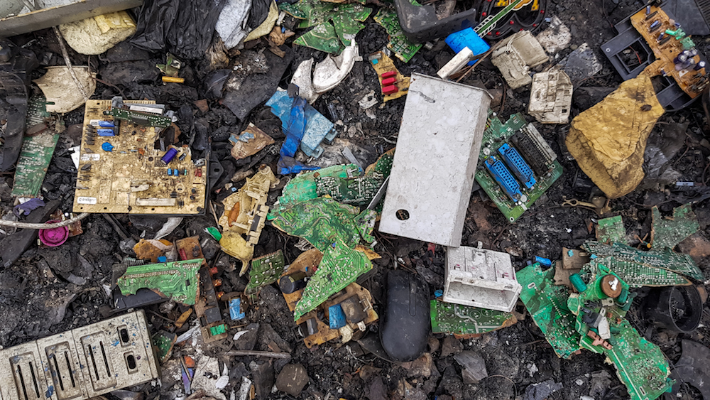 Less than 20% of the world's electronic waste gets recycled formally; the rest ends up in dumps like this one in Ghana, where informal recyclers may scavenge items to extract valuable materials under hazardous conditions. (Wikimedia Commons/Muntaka Chasan