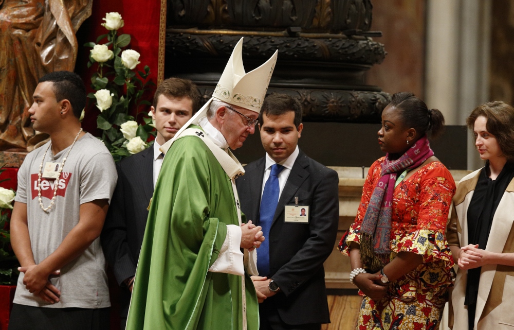 Pope Francis walks to his seat after greeting synod observers during the closing Mass of the Synod of Bishops on young people, the faith and vocational discernment in St. Peter's Basilica at the Vatican Oct. 28, 2018. (CNS/Paul Haring) Pope Francis walks to his seat after greeting synod observers during the closing Mass of the Synod of Bishops on young people, the faith and vocational discernment in St. Peter's Basilica at the Vatican Oct. 28, 2018. (CNS/Paul Haring)