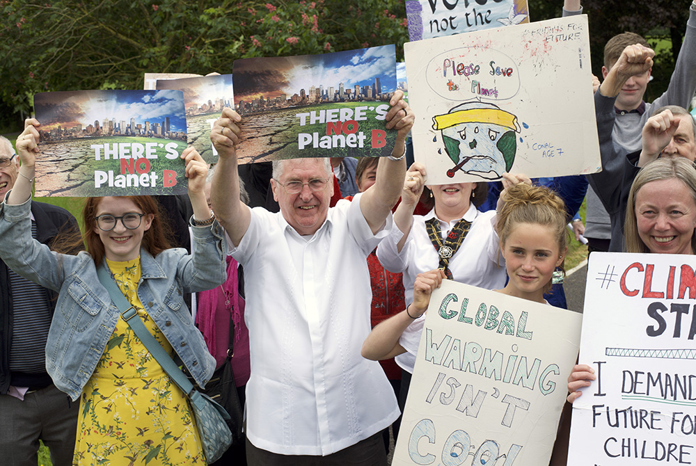 Fr. Seán McDonagh leads a climate strike in the grounds of Dalgan Park in Ireland, in this 2019 photo (Courtesy of Columban Missionaries)