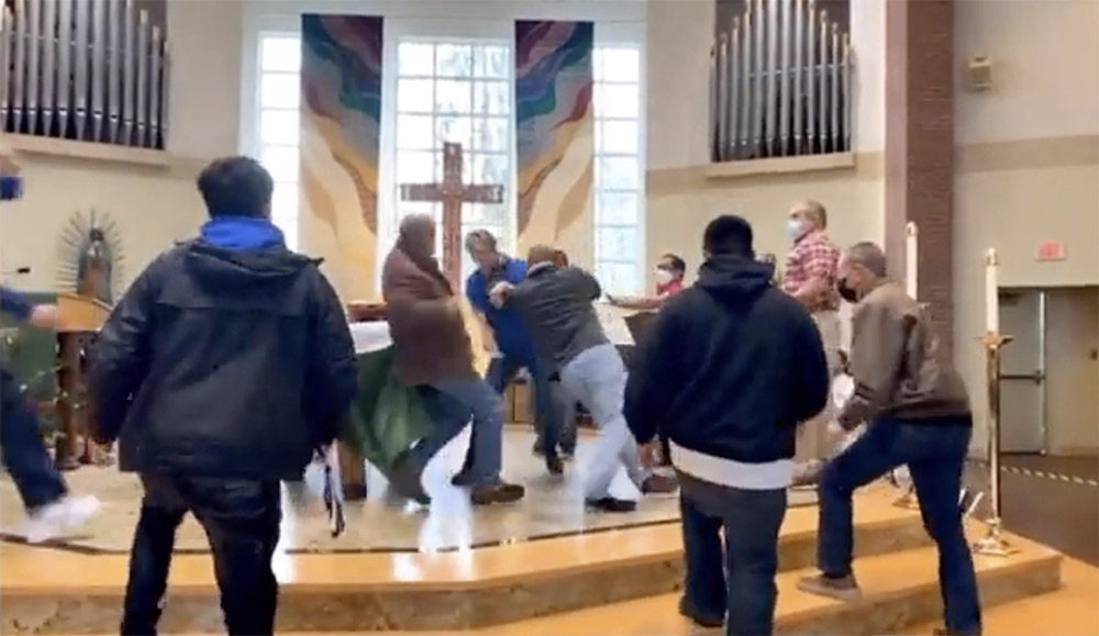 A screenshot of a video on Twitter of a confrontation at Mass Oct. 24 at St. Frances Cabrini Church in Lakewood, Washington (NCR screenshot)