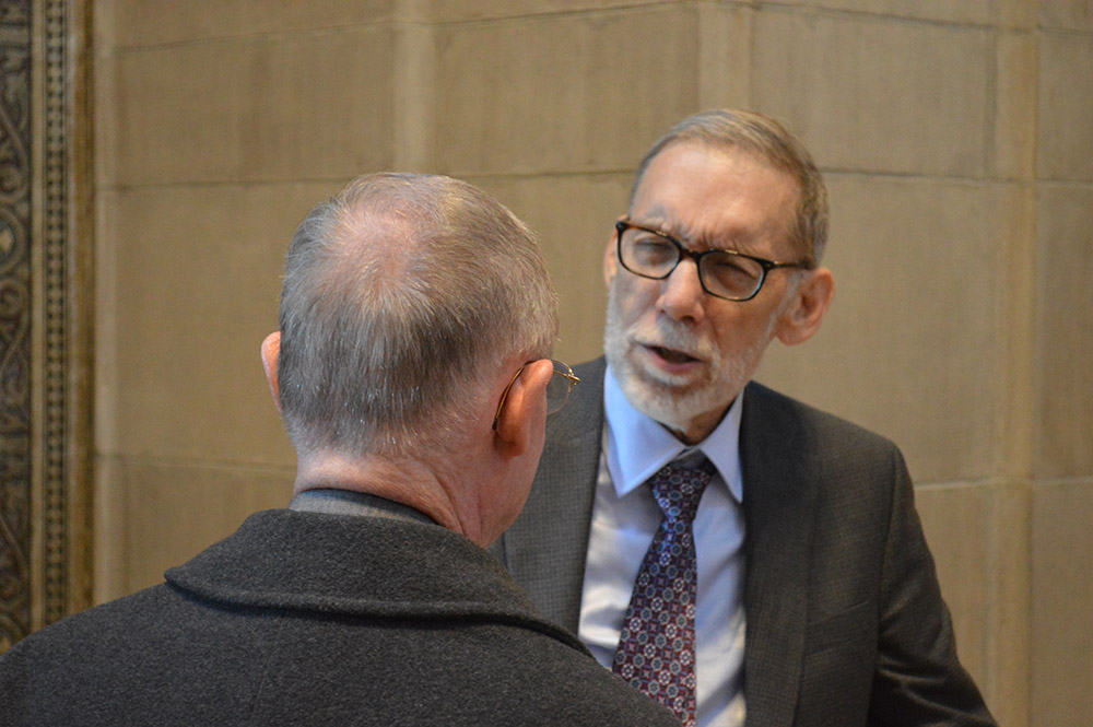 Richard Gaillardetz speaks with an attendee of the conference in his honor on Sept. 24 at Boston College. (Courtesy of the Lonergan Institute at Boston College)