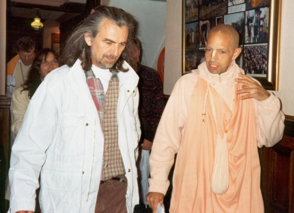 George Harrison talks with Mukunda Goswami in the corridors of the Bhaktivedanta Manor in England, June 1996 (Wikimedia Commons/Richard J. Cole, aka Radha Mohan Das)