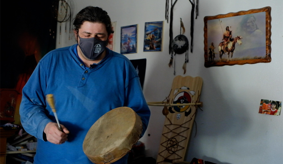 Jason Goward practices traditional Ojibwe hand drum songs. (Photo by Mary Annette Pember, Indian Country Today)