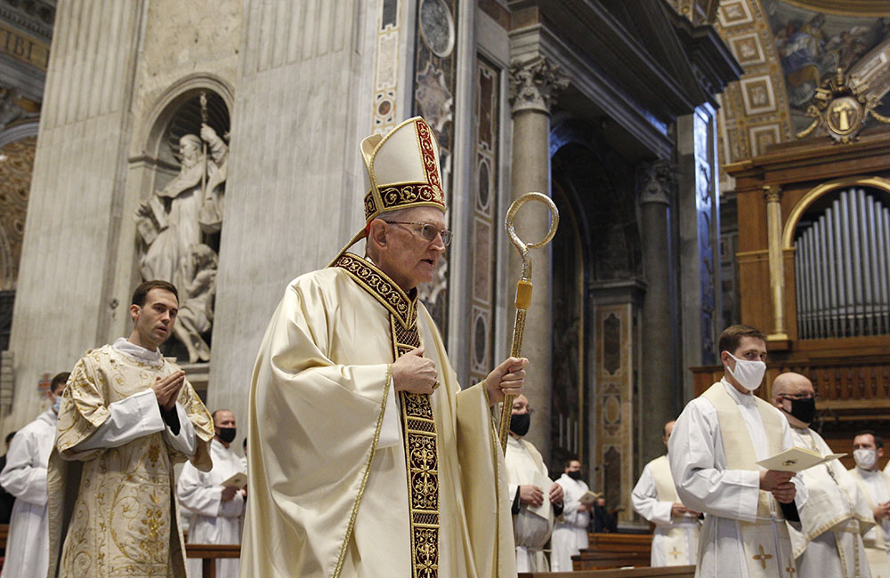 U.S. Cardinal James Harvey, archpriest of the Basilica of St. Paul Outside the Walls, arrives to preside over the ordination of eight deacons from Rome's Pontifical North American College, in St. Peter's Basilica at the Vatican Oct. 1. (CNS/Paul Haring)