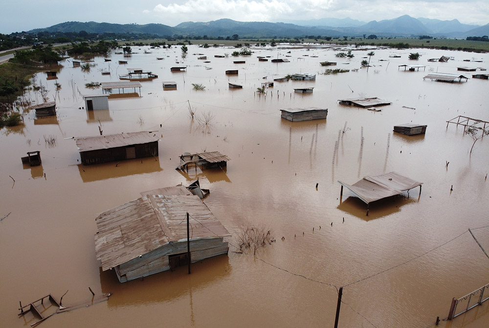 The town of Pimienta, Honduras, was flooded during Hurricane Iota in November 2020. While a lot of people were prepared, the flash flooding caught many by surprise and they lost all their belongings. (Photo courtesy of Sean Hawkey, World Council of Church The town of Pimienta, Honduras, was flooded during Hurricane Iota in November 2020. While a lot of people were prepared, the flash flooding caught many by surprise and they lost all their belongings. (Photo courtesy of Sean Hawkey, World Council of Church