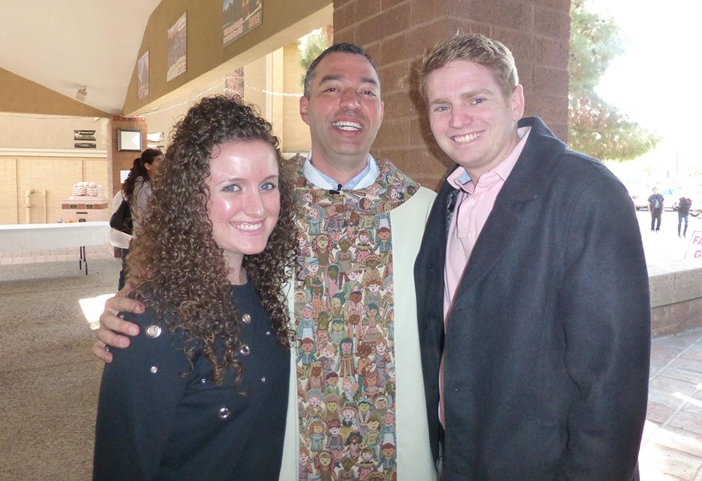 Kimberly Roland standing with Fr. Andrés Arango and her now husband Brendan Brady outside St. Jerome Parish in Phoenix, from around 2012-13 (Courtesy of Kimberly Roland) Kimberly Roland standing with Fr. Andrés Arango and her now husband Brendan Brady outside St. Jerome Parish in Phoenix, from around 2012-13 (Courtesy of Kimberly Roland)
