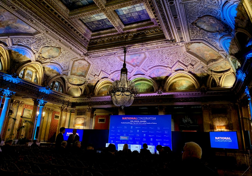 The National Conservatism event gets underway Feb. 4 in the ballroom of Rome’s Grand Hotel Plaza. (NCR photo/Joshua J. McElwee)