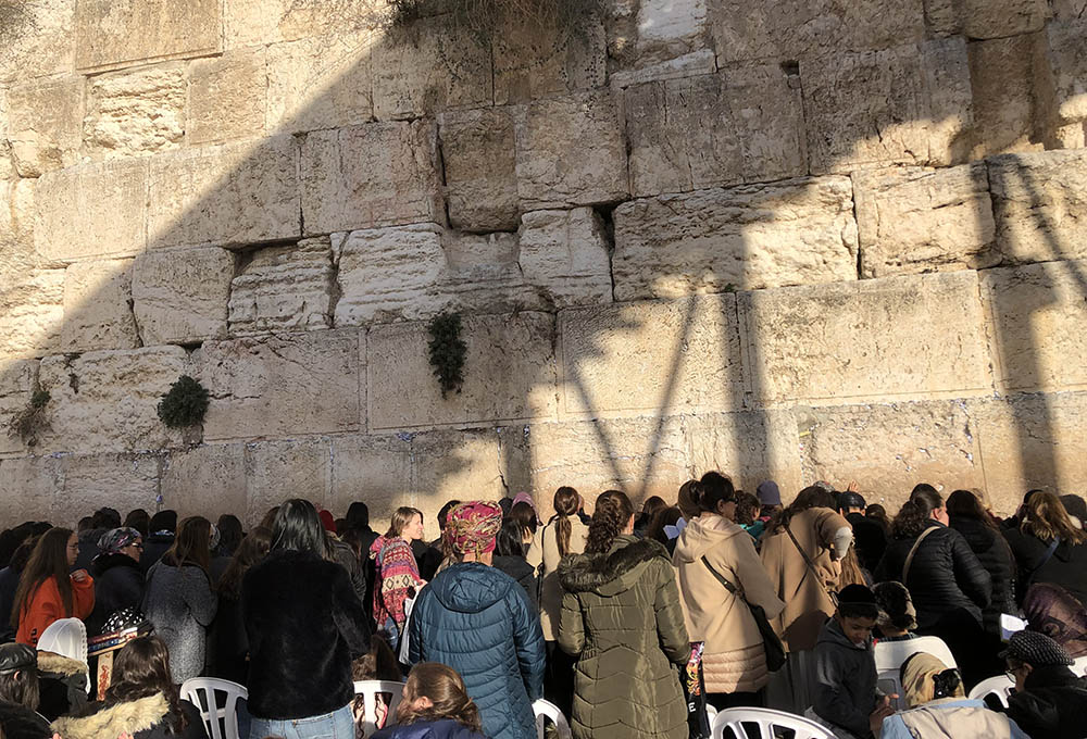 Pilgrims in the women's section at the Western Wall in December 2019 (Courtesy of Rose Pacatte)