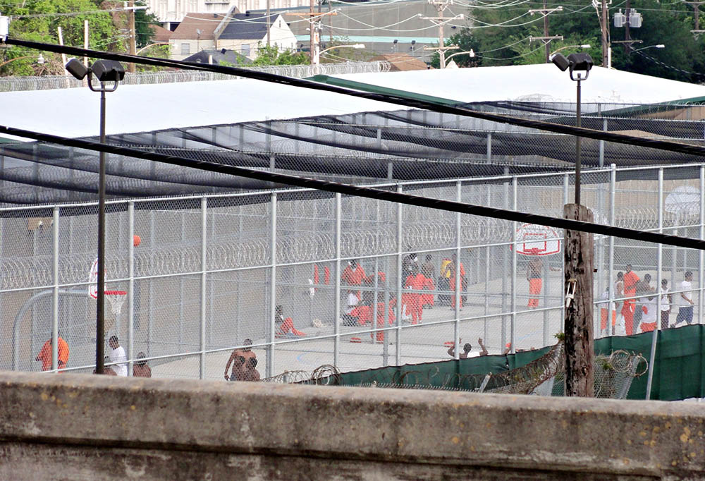 The yard of Orleans Parish Prison in New Orleans is seen from the overpass of what was then Jefferson Davis Parkway in 2012. Last year, the parkway was renamed for Norman Francis, former president of Xavier University of Louisiana. (Flickr/Bart Everson) The yard of Orleans Parish Prison in New Orleans is seen from the overpass of what was then Jefferson Davis Parkway in 2012. Last year, the parkway was renamed for Norman Francis, former president of Xavier University of Louisiana. (Flickr/Bart Everson)