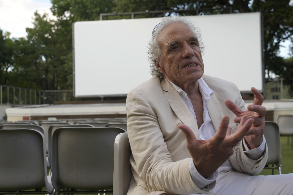 Director Abel Ferrara gestures during an Aug. 23 interview with The Associated Press on his latest movie "Padre Pio" in Rome. (AP/Gregorio Borgia)