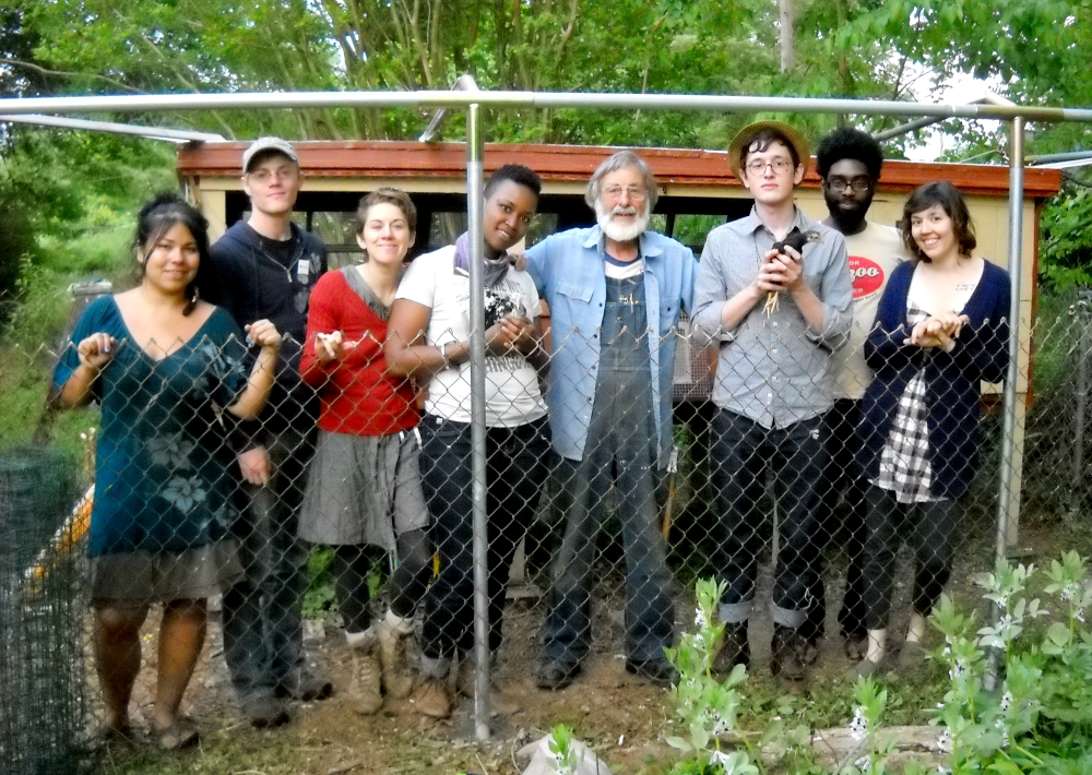 Karl Meyer (fourth from right) stands with other community members from the Nashville Greenlands Catholic Worker community in Tennessee. (Courtesy of Karl Meyer) Karl Meyer (fourth from right) stands with other community members from the Nashville Greenlands Catholic Worker community in Tennessee. (Courtesy of Karl Meyer)