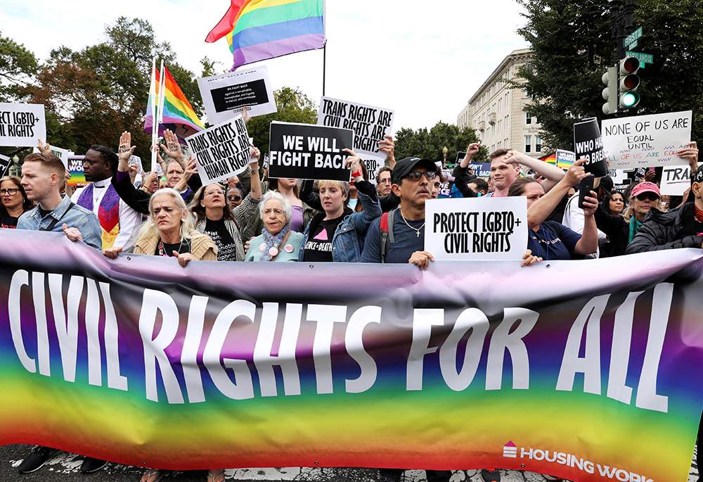Pictured in this Oct. 8, 2019, file photo are LGBT activists block the street outside the U.S. Supreme Court in Washington. (CNS/Reuters/Jonathan Ernst)