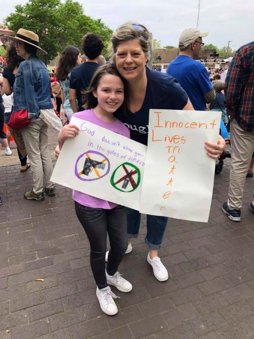 Laurie Delgatto-Whitten with her goddaughter during the 2018 March for Our Lives in downtown Houston (Provided photo)