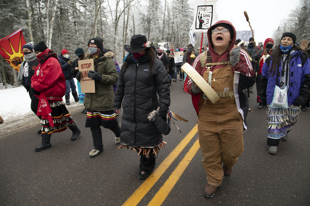 Indigenous water protectors protest construction of the Enbridge Line 3 pipeline near Palisade, Minnesota, Jan. 9, 2021. (© Keri Pickett)
