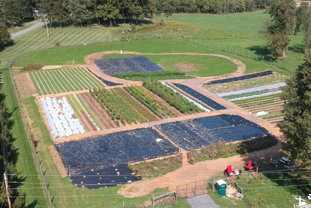 An aerial photograph of Little Portion Farm in Ellicott City, Maryland, which raises organic crops for a soup kitchen in nearby Baltimore. The photograph was part of the presentation by Matthew Jones, farm and outreach coordinator for Little Portion Farm,