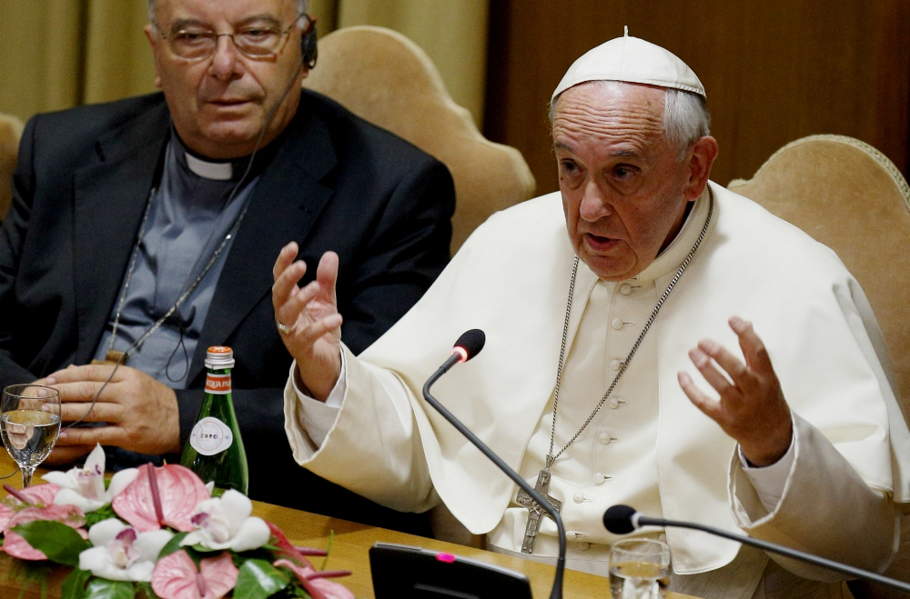 Pope Francis addresses mayors from around the world at a workshop on climate change and human trafficking in the synod hall at the Vatican July 21, 2015. (CNS/Paul Haring)