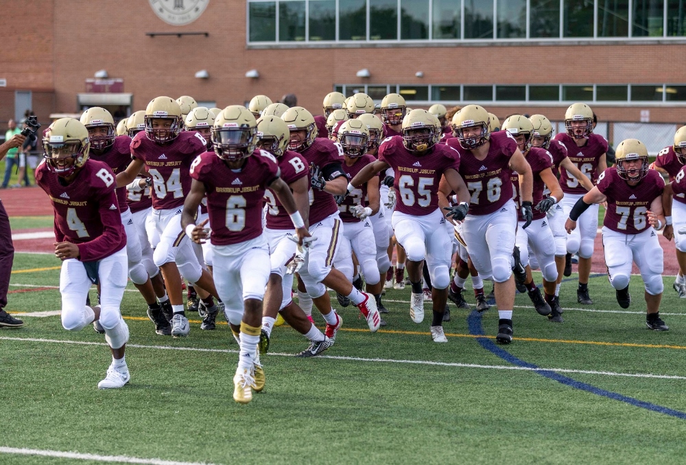 The varsity football team of Brebeuf Jesuit Preparatory School in Indianapolis at an Aug. 16 game (Michael Hoffbauer Photography) The varsity football team of Brebeuf Jesuit Preparatory School in Indianapolis at an Aug. 16 game (Michael Hoffbauer Photography)